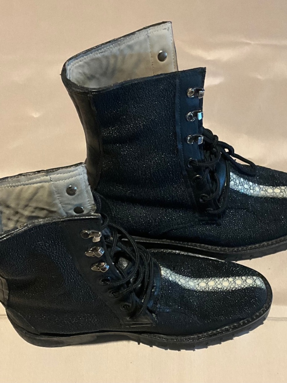 Men’s exotic full stingray accented leather combat boot. Size 9